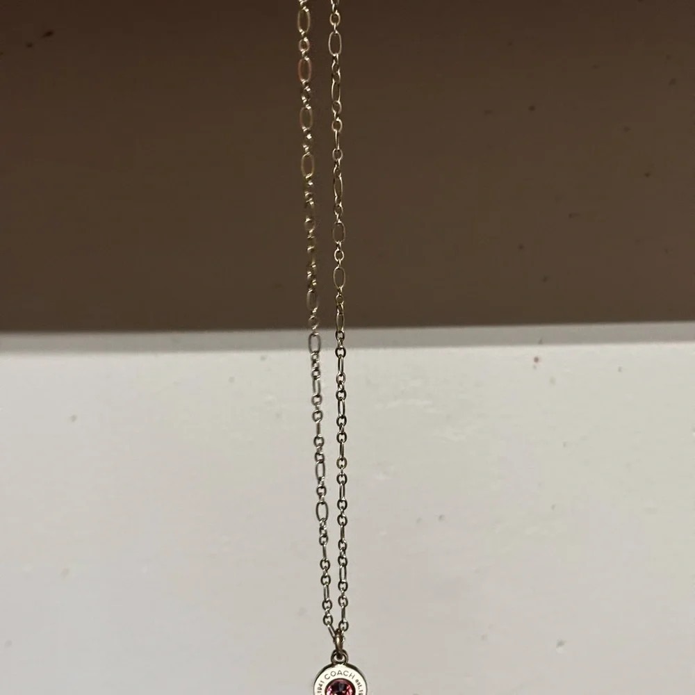 Coach Silver Necklace- White “COACH” Charm with Pink Rhinestone Center - Picture 4 of 8